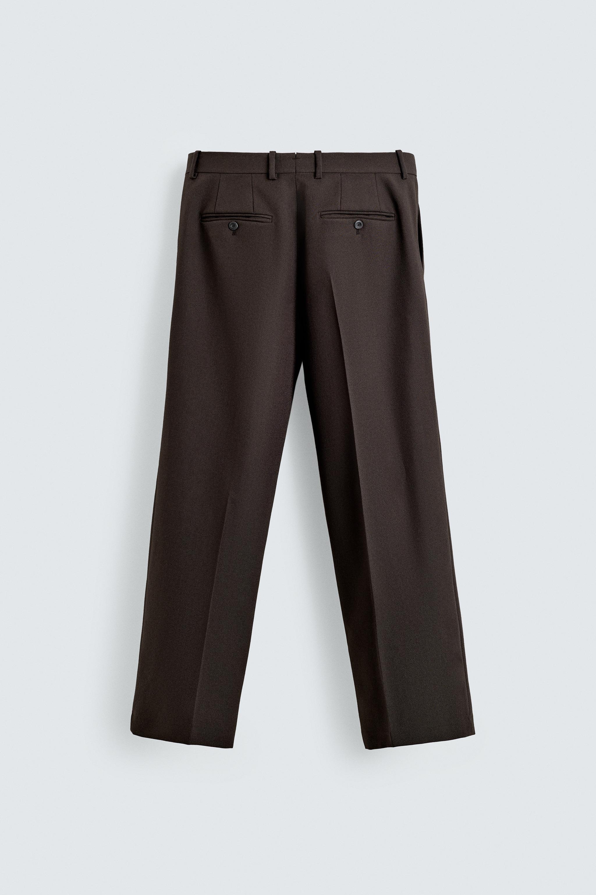 100% WOOL PLEATED PANTS